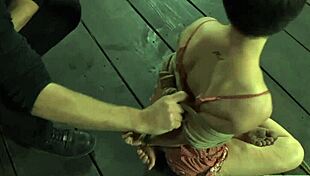 Girl rips clothes stripping in cage!