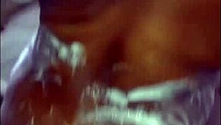 in the reality of friends, a horny black busty mature girlfriend kneels to suck her boyfriend's cock close up