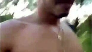 in the public park, two gay amateurs engage in live bareback sex outdoors