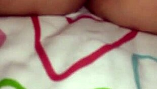 In the quiet room, a JAPANESE beauty gets her ASIAN pussy FINGERED deeply by skilled hands.