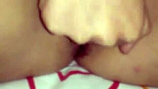 In the quiet room, a JAPANESE beauty gets her ASIAN pussy FINGERED deeply by skilled hands.