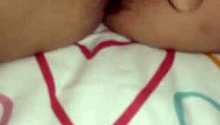 In the quiet room, a JAPANESE beauty gets her ASIAN pussy FINGERED deeply by skilled hands.