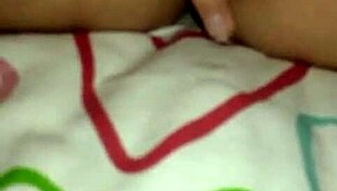 In the quiet room, a JAPANESE beauty gets her ASIAN pussy FINGERED deeply by skilled hands.