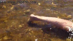 In the water of the Volga River, enjoying a beach day in a bikini.