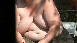 chillin topless in the garden sun