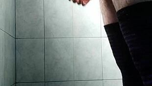 Gay guy masturbates with stockings.