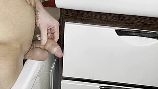 supermdick33 jerks off his shaved cock in the bathroom close up