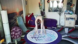 Redhead mommy stretches in yoga with shaved cameltoe exposed.