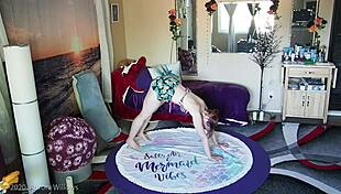 Redhead mommy stretches in yoga with shaved cameltoe exposed.