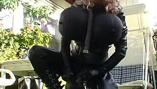 Roxina In Rubber Gear Exploring Garden Nature Scene
