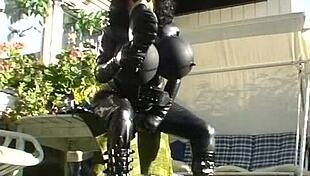 Roxina In Rubber Gear Exploring Garden Nature Scene