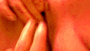 Blonde Babe Indulges In Private Moments On The Bed