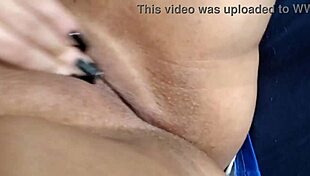 The naughty girl with small tits continues her solo masturbation, wetting her pussy in part two