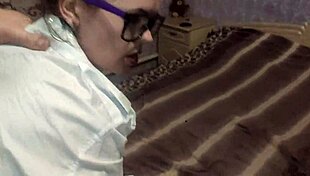 A powerful blowjob and facial for a woman in glasses