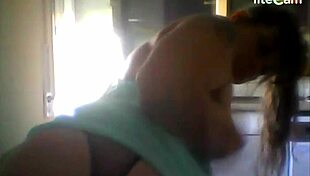 The milf shows off her big tits.