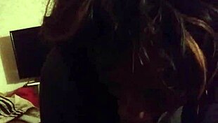 she loves sucking this big cock, licking every inch while moaning softly