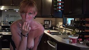 sexy redhead dancing in the kitchen