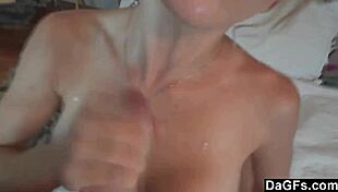 My wife slips into a latex costume in the bedroom, toys around, and I cum on her big tits