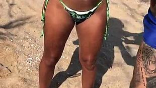 African Lesbian Wife Applies Sunscreen on Beach While Filming Passionate Moments