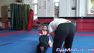 these lesbian babes are wrestling in costumes and licking each other