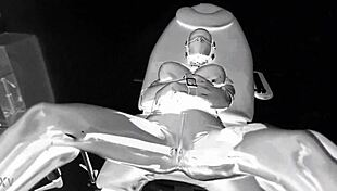 Latex Catsuit In Medical Chair