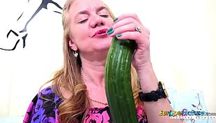 Mature Woman Uses Cucumber and Toy