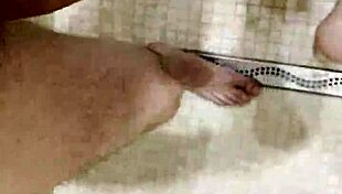 teen brunette showers and sucks cock