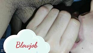 brunette gives blowjob to black cock