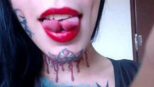 Brunette Shemale Offers Tatted Tits and Asshole for Licking