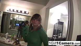 Alice Bell plays with her camera in close up masturbation of tits, ass, and pussy.