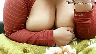 This sexy Indian lady shows off her big tits.