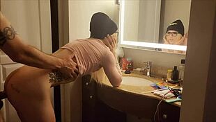 Sissy watches big cock in bathroom mirror