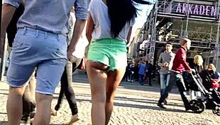 Hot girl with booty shorts walking on the street?