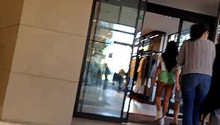 Hot girl with booty shorts walking on the street?