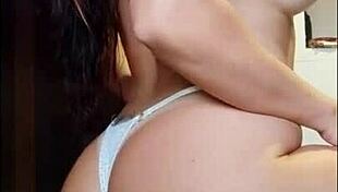 redhead sensualizing her big tits for friend