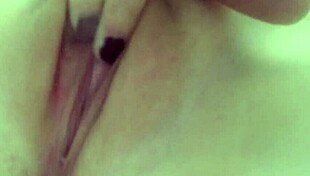 curious wife fingers herself in private moment