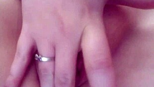 curious wife fingers herself in private moment