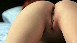 Redhead babe michelle h undresses softly!