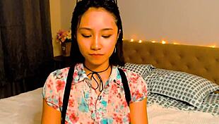 beautiful asian slut in cosplay fingering on webcam, teasing as little whore