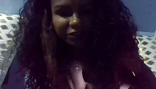 Sweet black curly girl fingering her wet pussy