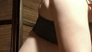 Busty camgirl in grey explores her curves