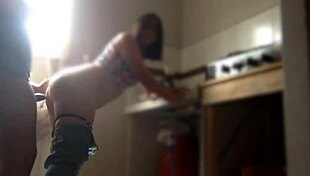 In the kitchen she gets hot and likes me to fuck her standing up
