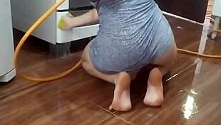 Maid Washes Stove Naked In Intense Fetish Video