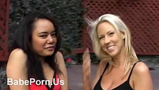 Blonde and exotic babe performers in a licking scene