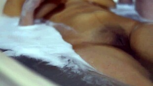 The student kissed her boyfriend passionately in the apartment, making it clear the night would be full of intensity and connection.