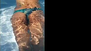 Masturbating in the pool with monster cock