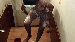 Bathroom lesbian engages in anal licking and assfucking