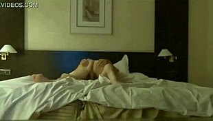 Couple Enjoys Intimate Moments In The Hotel Room, Exploring Amateur Desires With Subtle Tension