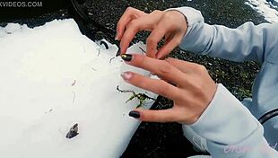 i white cat mya creates snow sculpture art on nacchi travel trip