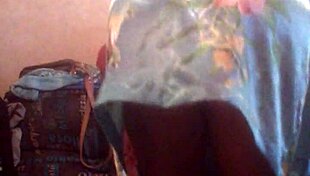 Video of someone alone at home in intriguing setting.